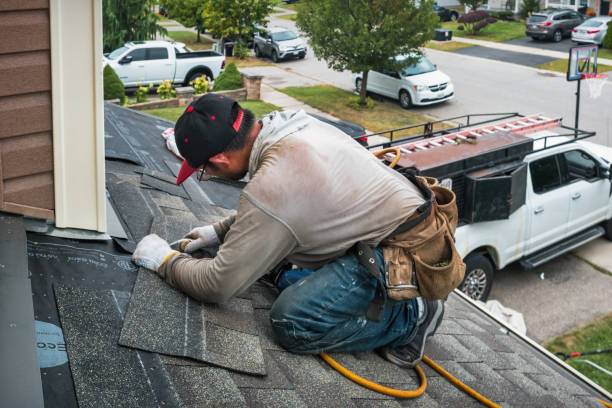 Professional Roofing technician working in Marlow, OK